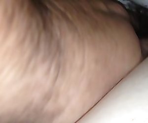 rubbing her sofy chubby hairy pussy under the sheet