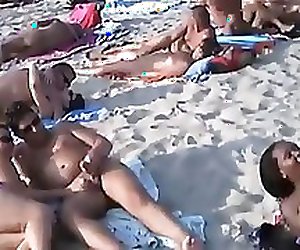 Blowjobs  and sex on a nudist beach
